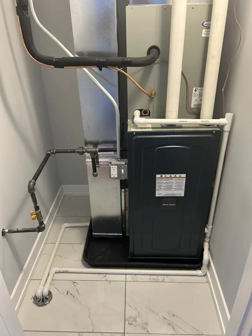 technician performing a load calculation for furnace installation in Glenview home - furnace installation Glenview