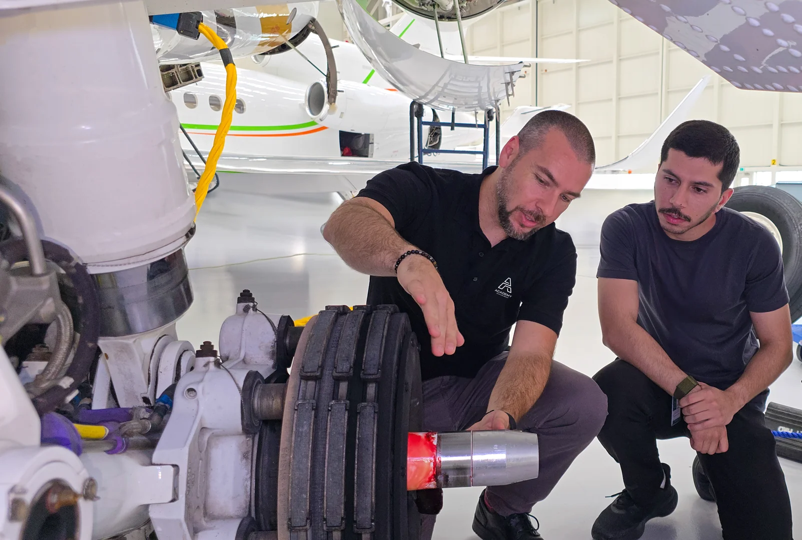 aviation maintenance hangar with various business aircraft