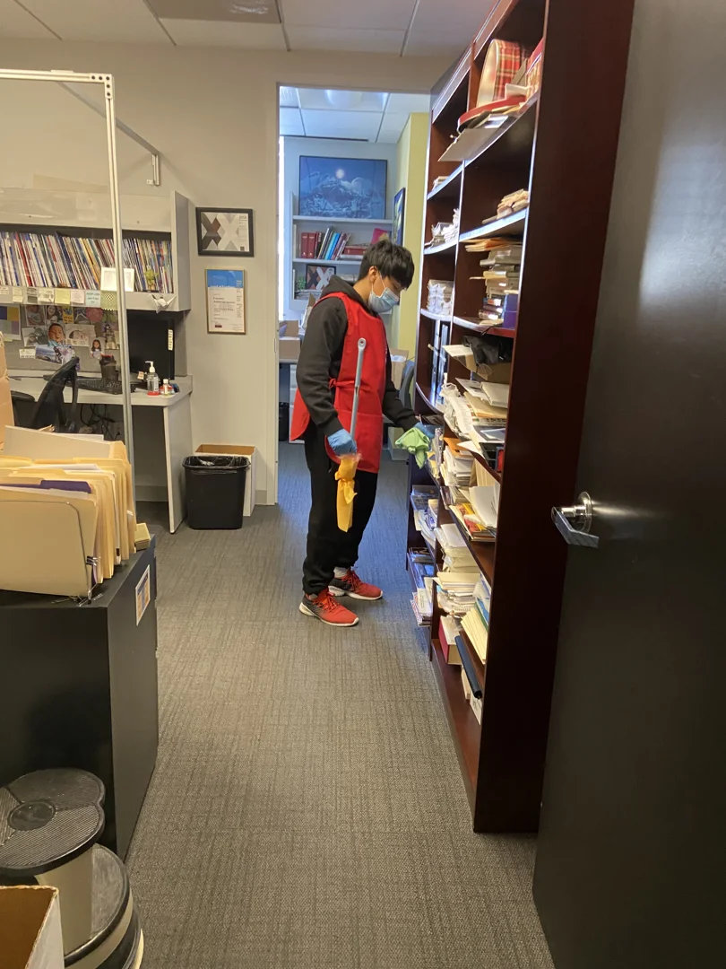 professional janitorial team cleaning an office