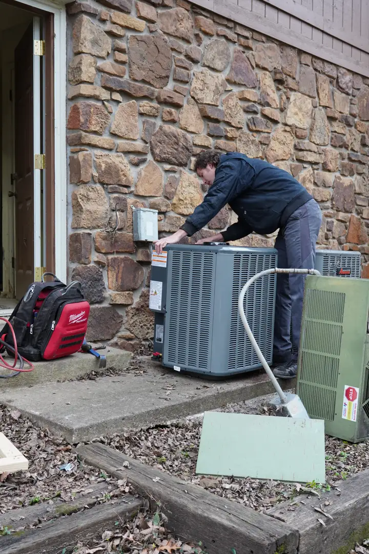 A clean and organized HVAC installation site in a Bartlesville residence showing new equipment and professional tools - ac