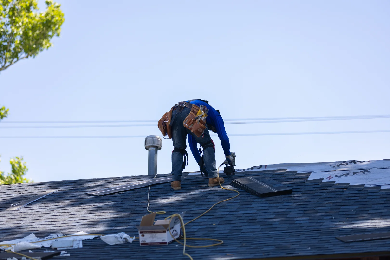 exterior contractors repairing roof eaves on a home exterior contractors repairing roof eaves on a home