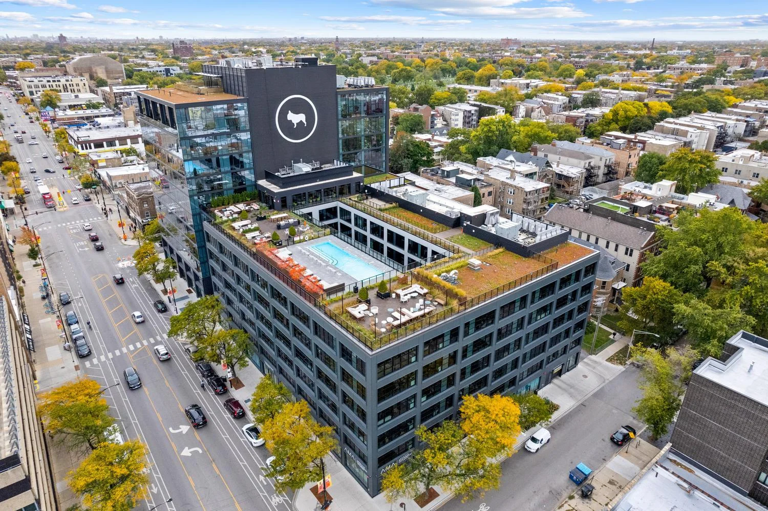 Sleek modern exterior of a luxury serviced apartment building
