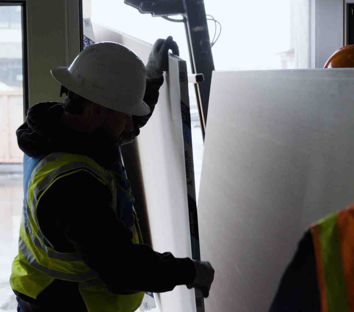 Commercial interior showing clean wallboard finish and ceiling details Commercial interior showing clean wallboard finish and ceiling details