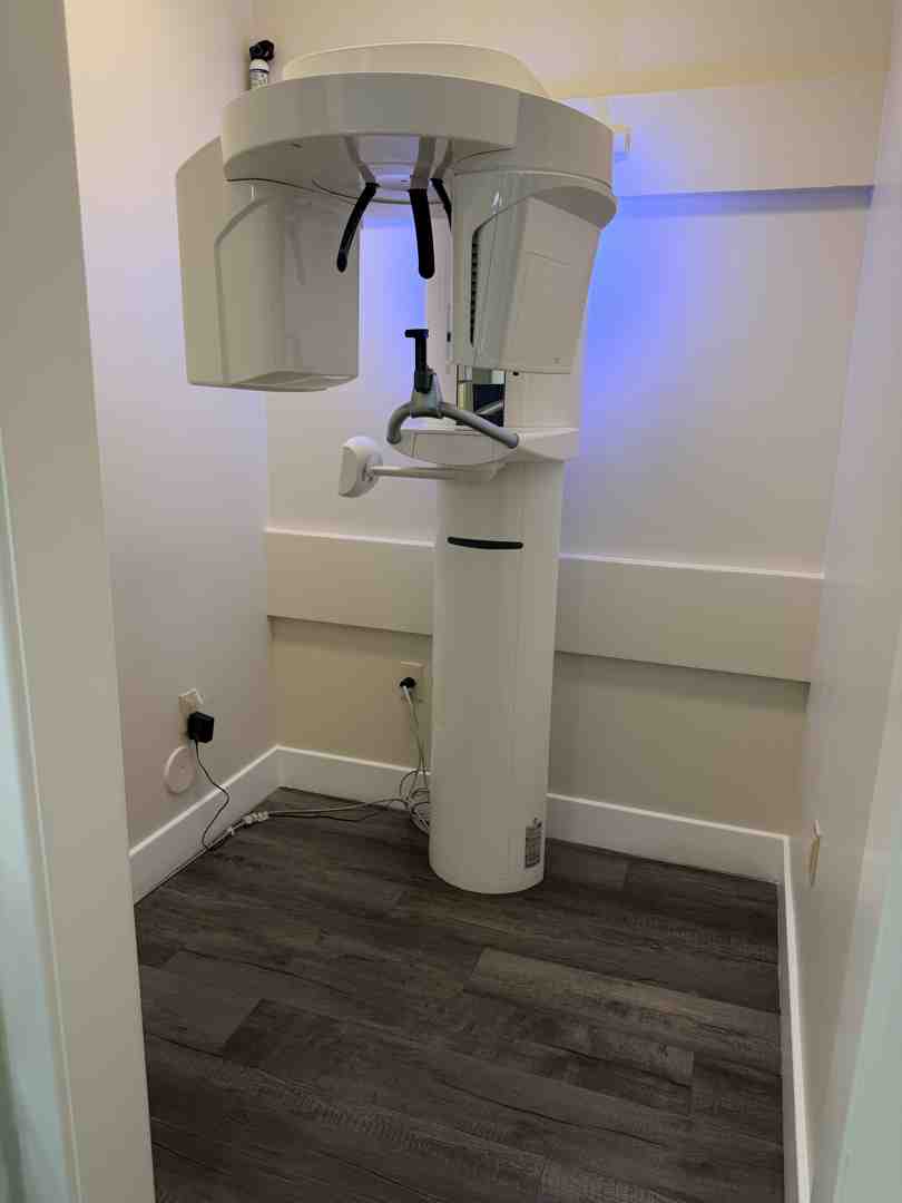A dentist performing an airway evaluation using advanced 3D imaging technology A dentist performing an airway evaluation using advanced 3D imaging technology