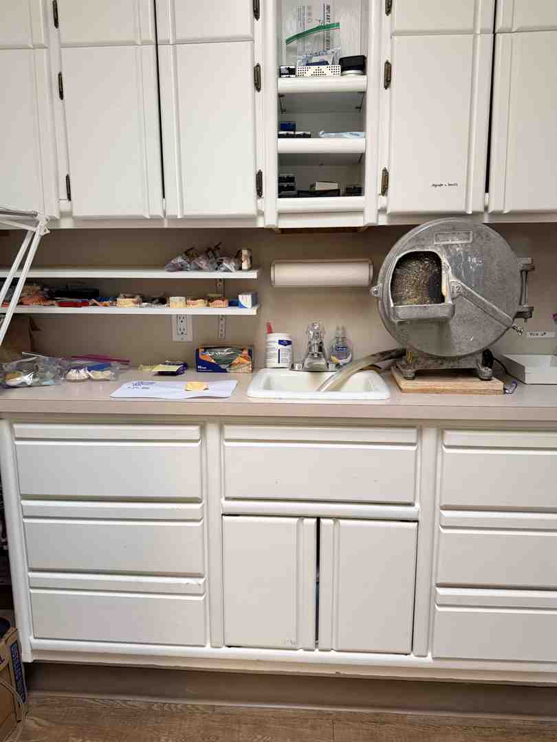 A display of various dental restoration materials: porcelain, composite resin, and titanium - restorative dental treatment