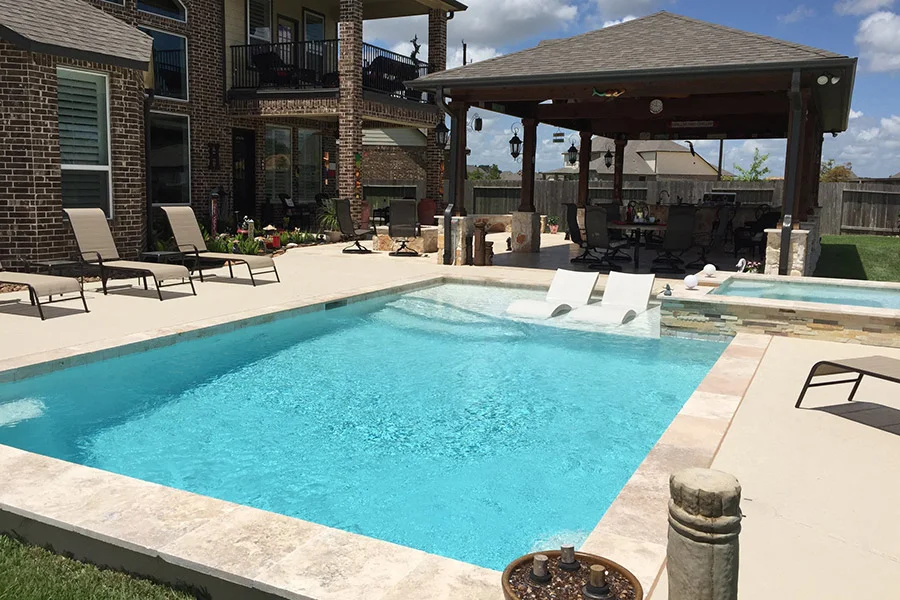 modern rectangular plunge pool integrated into a flat Texas patio - cost of plunge pool modern rectangular plunge pool integrated into a flat Texas patio - cost of plunge pool