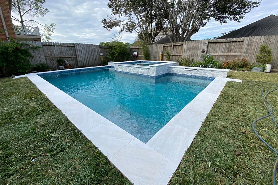 modern geometric pool design in a suburban Houston neighborhood - cost of custom pools modern geometric pool design in a suburban Houston neighborhood - cost of custom pools