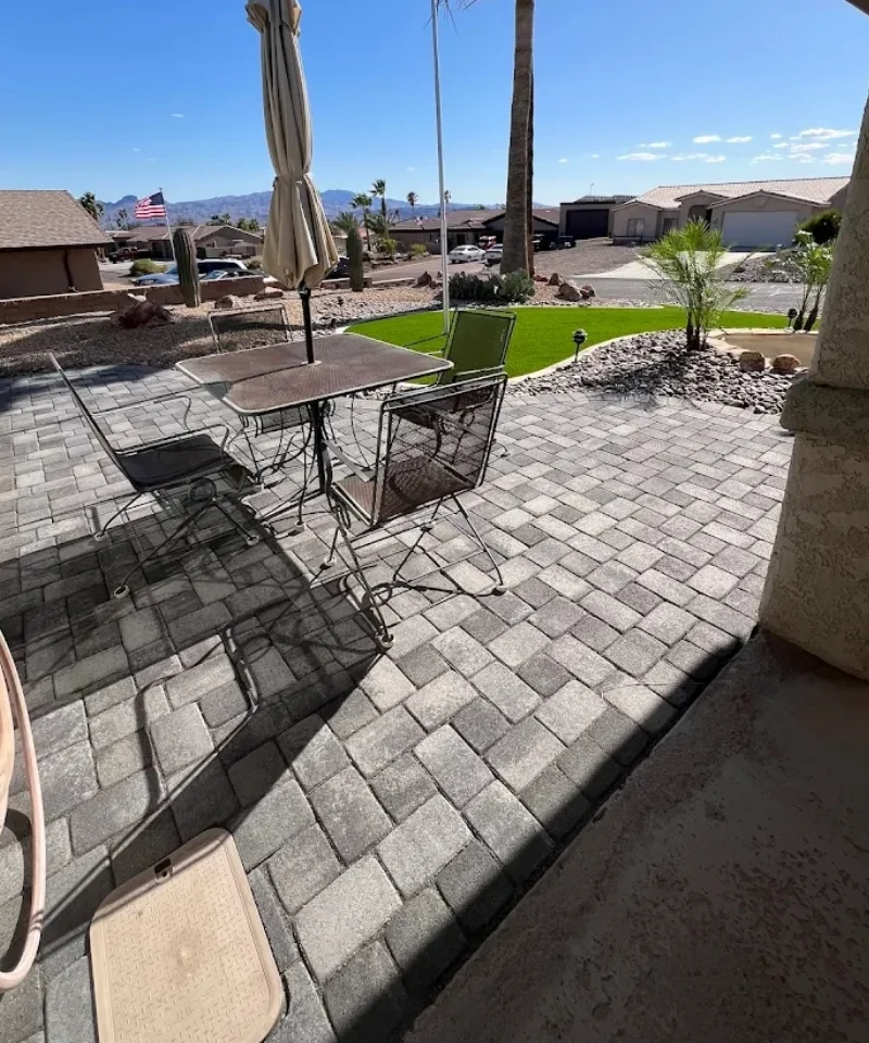 completed desert landscaping project with drip irrigation and paver patio golden shores az
