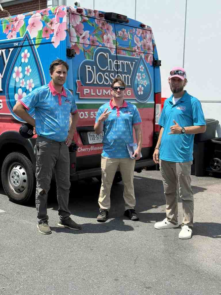 a plumber arriving at a home at night with a well-equipped van - Plumber Falls Church VA