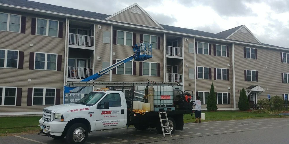 Professional soft washing equipment in use