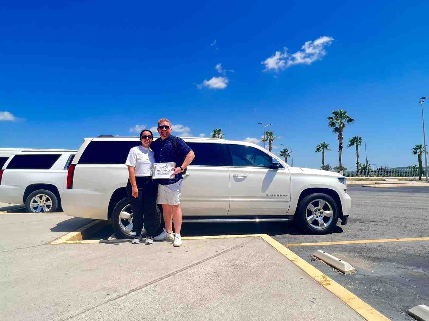 Happy group arriving at their Los Cabos destination - Los Cabos group transportation