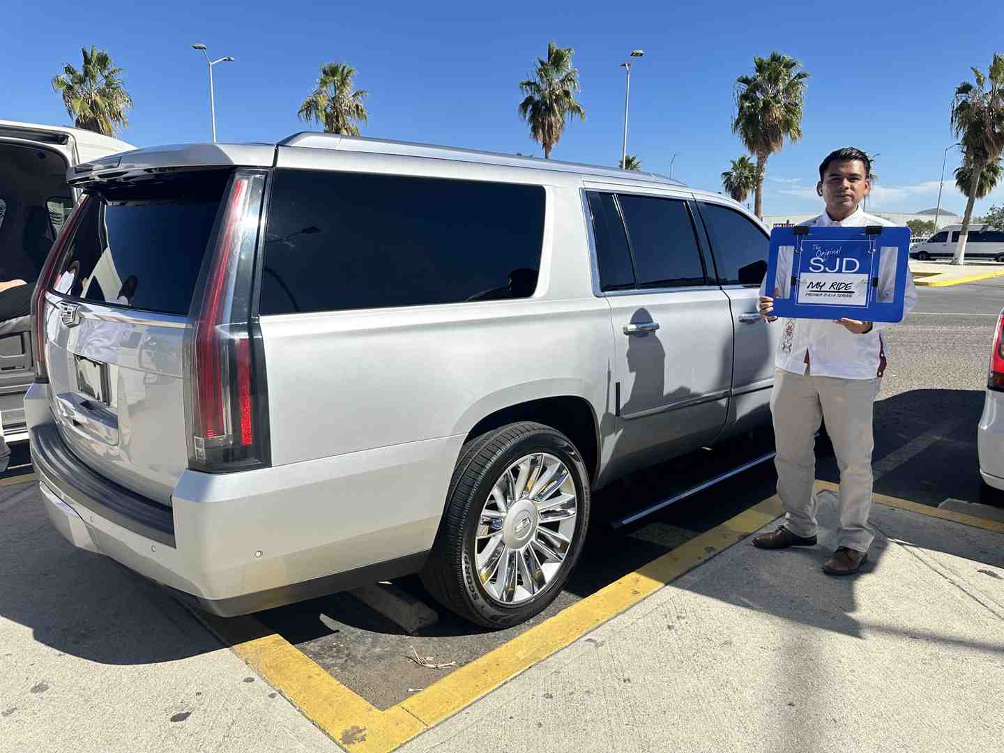 interior of a luxury SUV with cold beverages waiting - Airport transportation Cabo