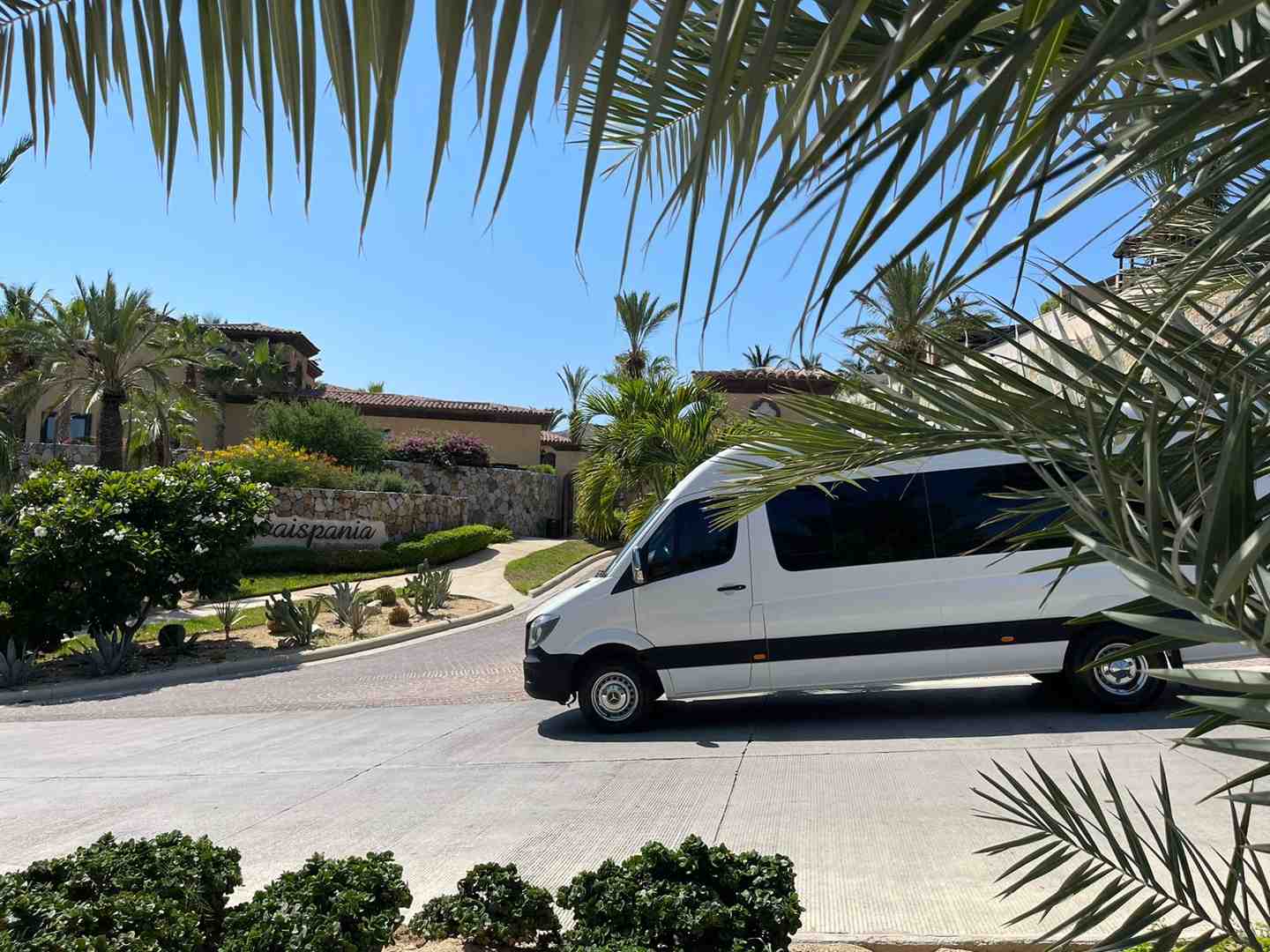 A panoramic view of the Los Cabos coastline with a shuttle van driving along the scenic route, heading towards a resort. - sjd airport shuttle to hotel A panoramic view of the Los Cabos coastline with a shuttle van driving along the scenic route, heading towards a resort. - sjd airport shuttle to hotel