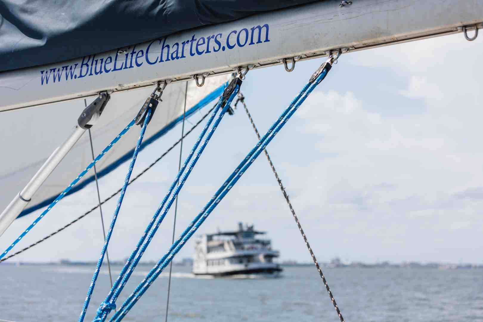 charter agreement document with a magnifying glass over the signature line - bareboat charter agreement