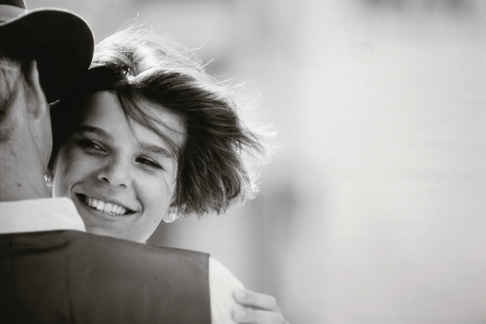 close up of a black white photo of a happy woman hugging her partner-premarital counseling Portland Oregon close up of a black white photo of a happy woman hugging her partner-premarital counseling Portland Oregon