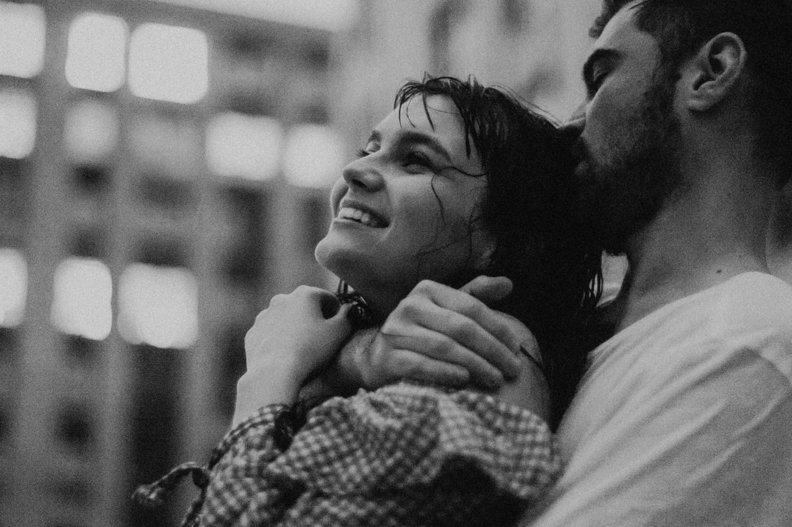 a back and white photo of a male partner kissing the back of a female partner's head lovingly- signaling secure attachment in marriage — key steps and milestones - strengthen your marriage a back and white photo of a male partner kissing the back of a female partner's head lovingly- signaling secure attachment in marriage — key steps and milestones - strengthen your marriage