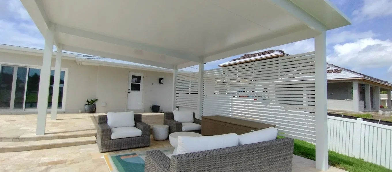 Aluminum pergola installation Aluminum pergola covering a residential outdoor living area