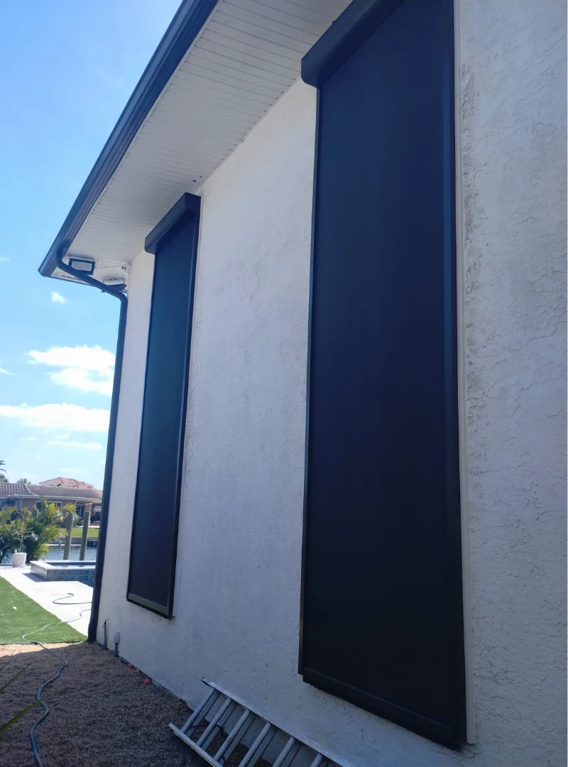 wind-resistant outdoor shade system installed on a Florida home