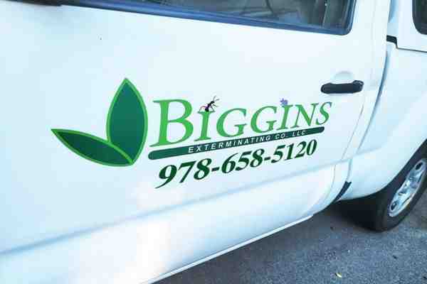 Biggins Exterminating truck in front of a house - mice extermination cost
