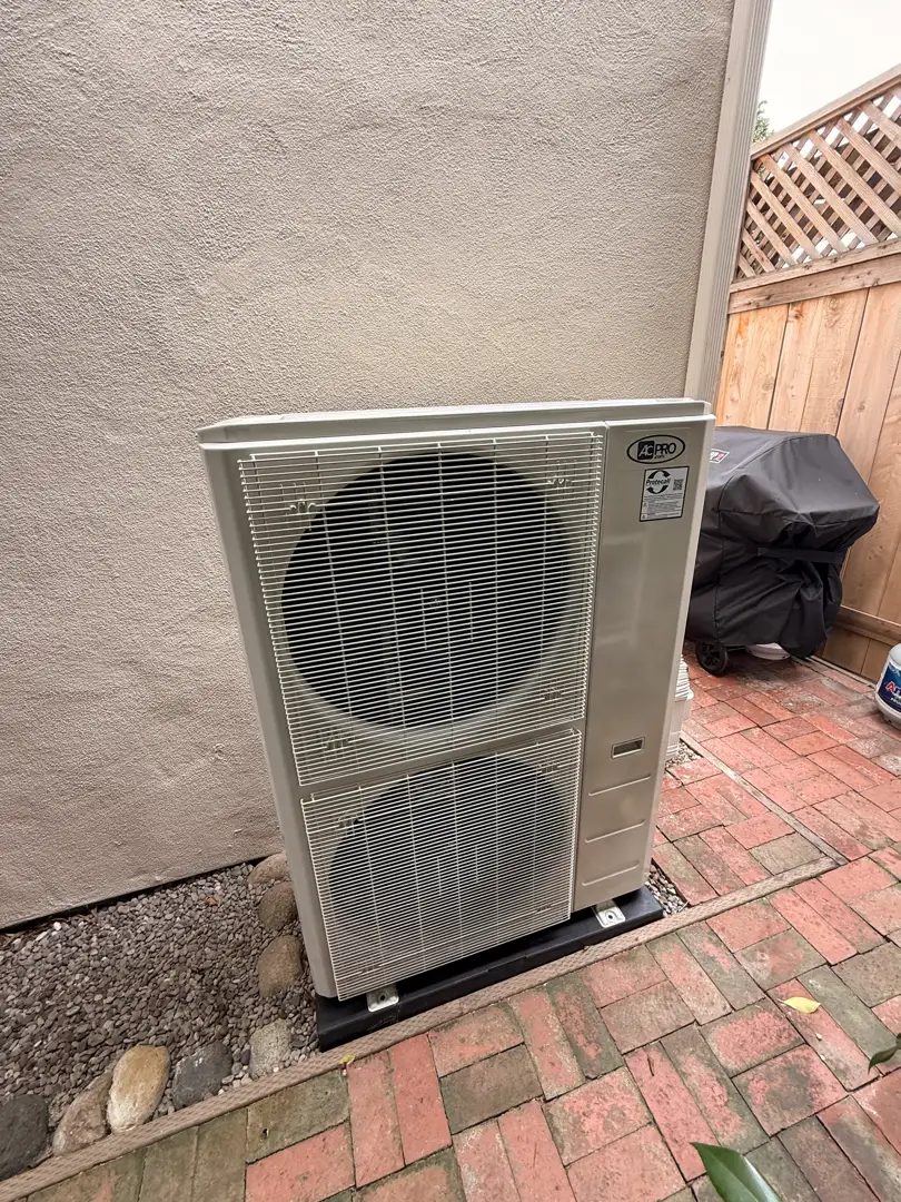 central air conditioning unit in a San Diego backyard surrounded by palm trees - why is my ac running but not cooling central air conditioning unit in a San Diego backyard surrounded by palm trees - why is my ac running but not cooling