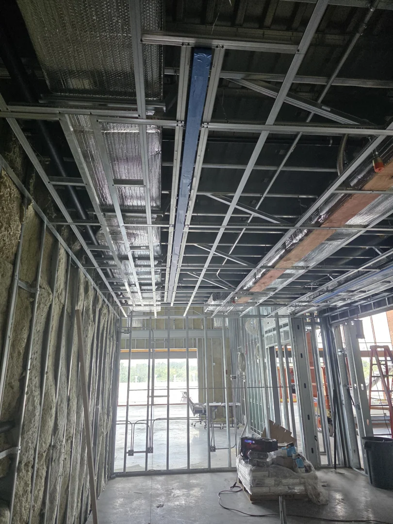 licensed electrician inspecting rough-in ceiling conduit licensed electrician inspecting rough-in ceiling conduit