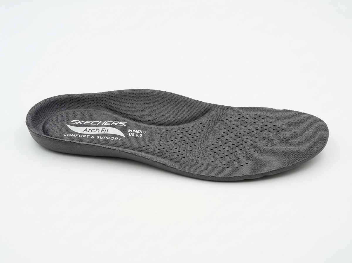 Removable Arch Fit insole showing the contoured support and breathable perforations - arch fit womens shoes