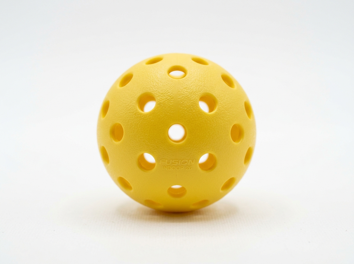 Close-up of indoor pickleball hole patterns and precision molding - indoor pickleballs