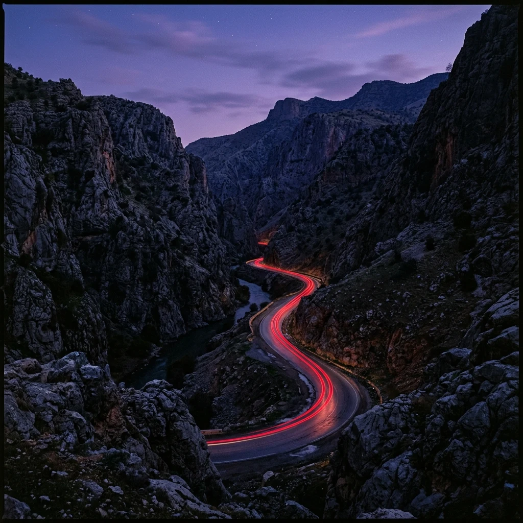 Winding mountain road at twilight