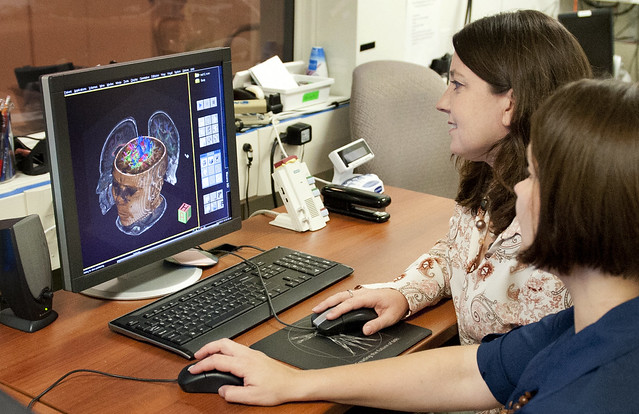 MRI technologist on computer