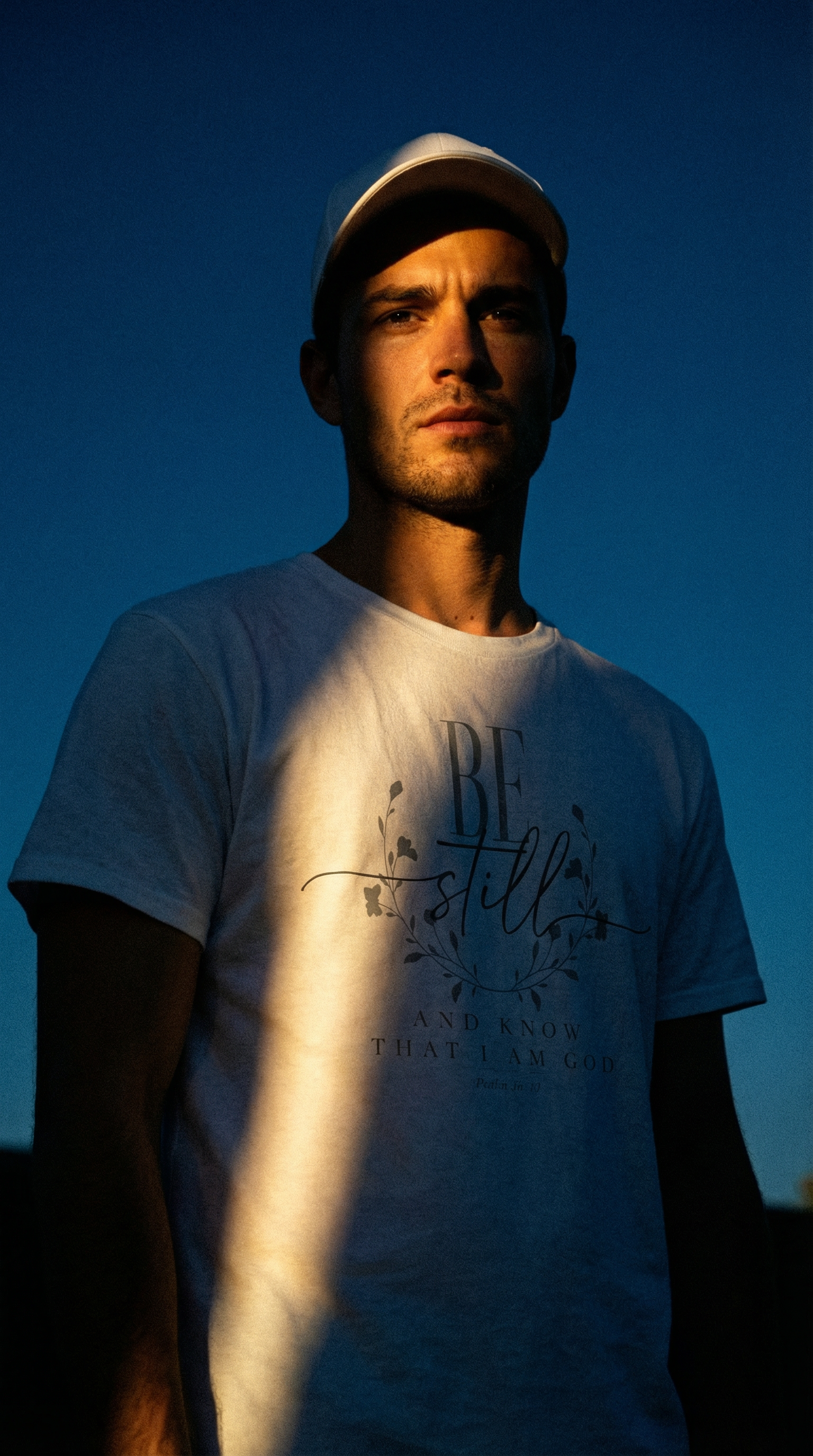 AI product shot of BE STILL AND KNOW I AM GOD T-shirt