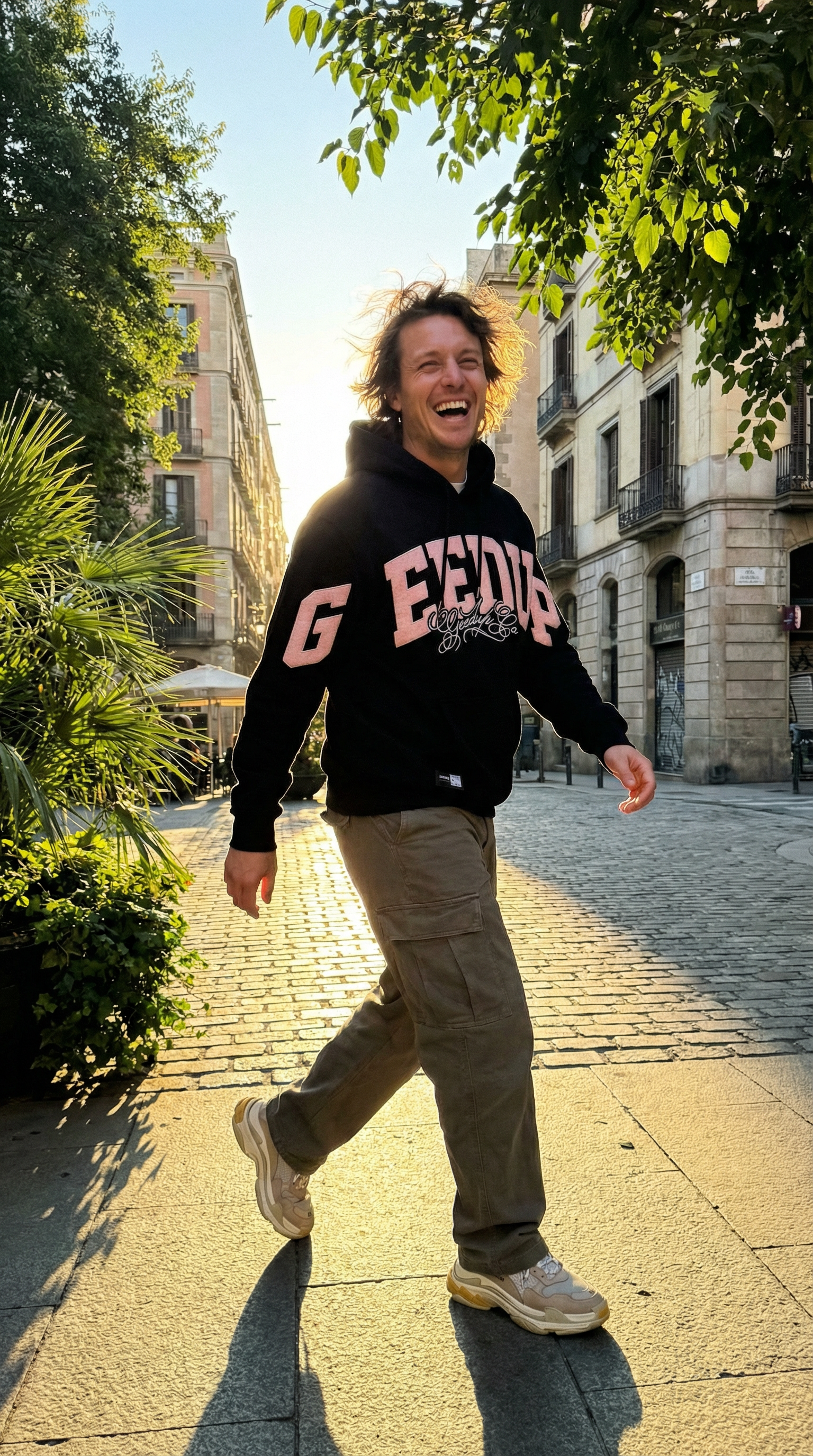 AI product shot of Team Logo Script Hoodie Black/Dusty Pink
