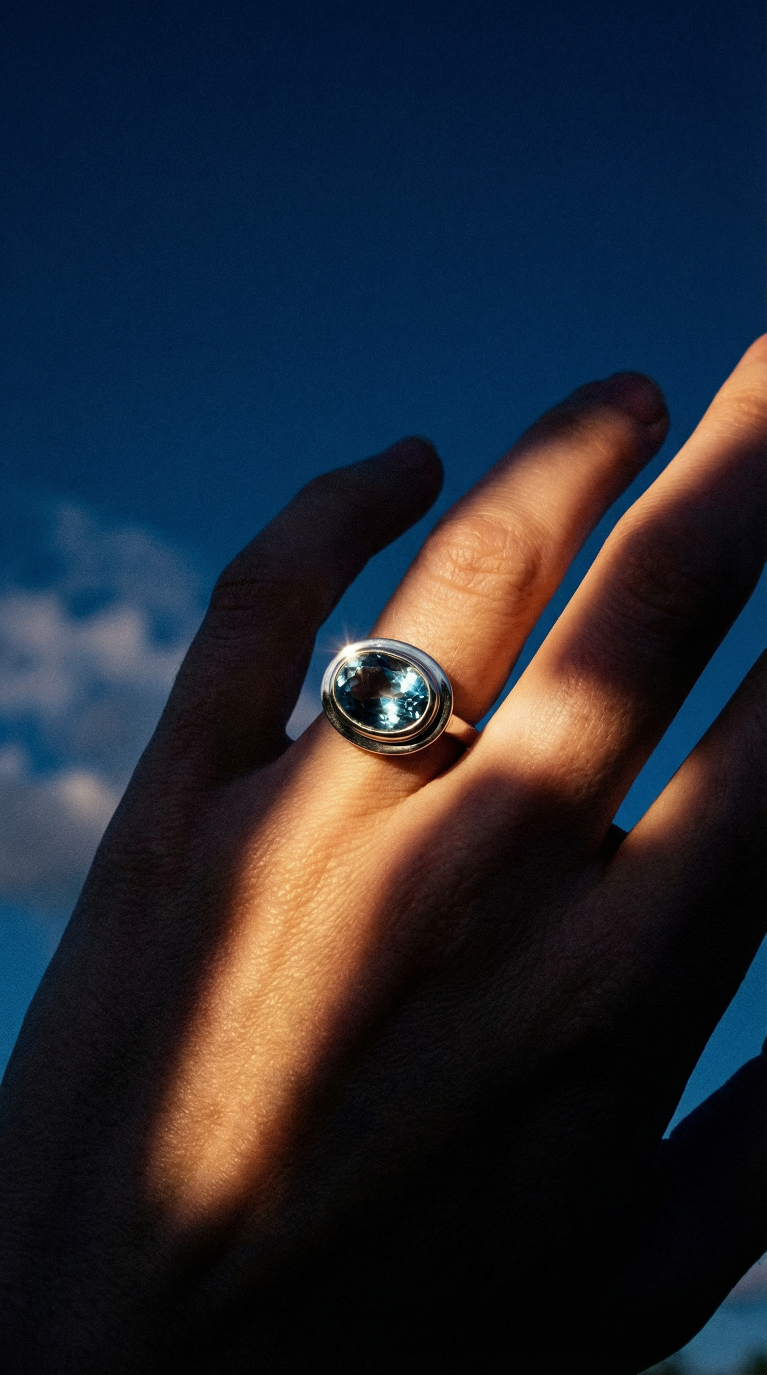 AI product shot of Oval-cut Sky Blue Topaz gemstone Ring - Avery