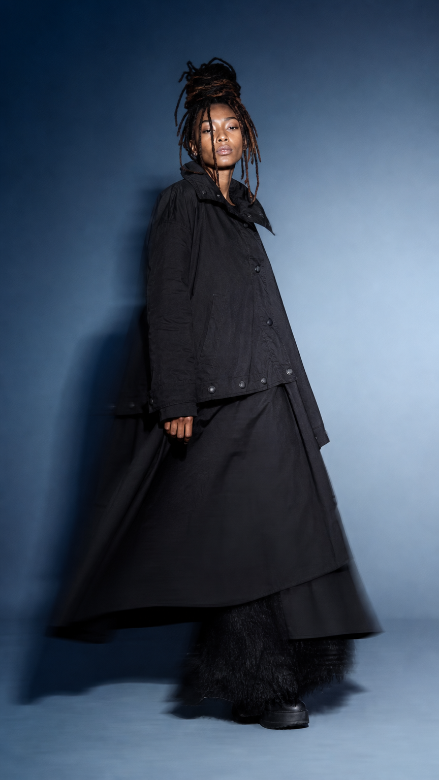 AI product shot of La Vaca Loca Black Pluma Trench Coat