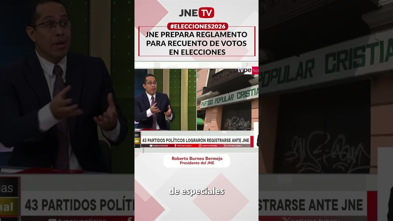 Presentador explicando reglamento electoral con detalles del JNE