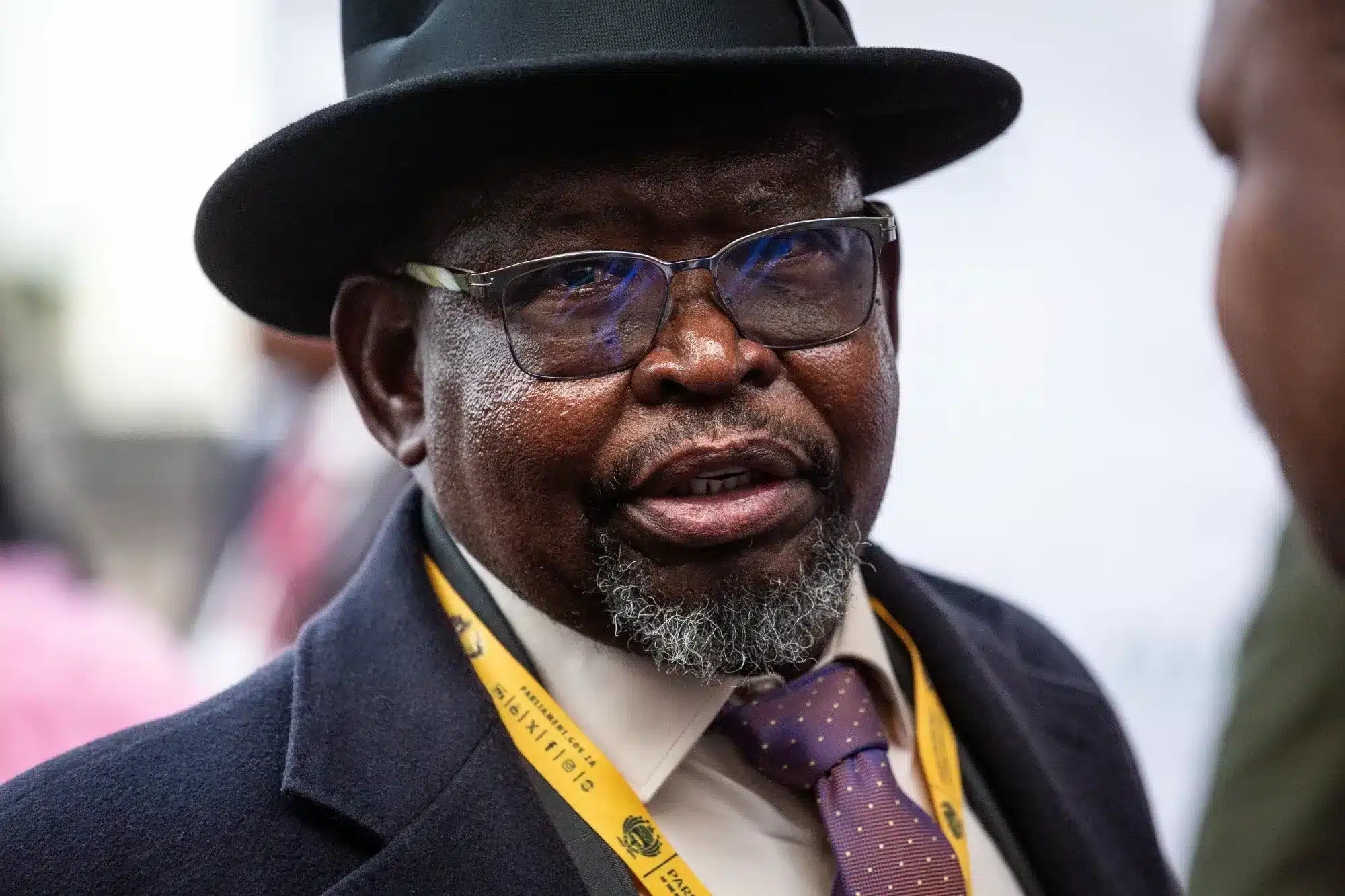 Ministro de finanzas sudafricano en evento formal