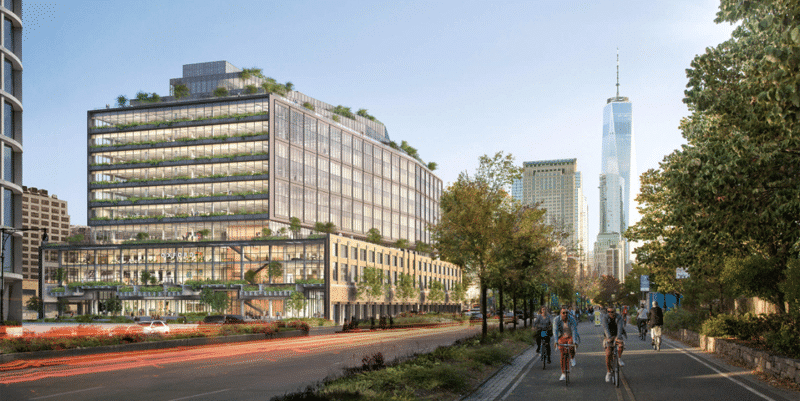 Edificio de oficinas moderno con vegetaci&oacute;n, simbolizando innovaci&oacute;n y desarrollo tecnol&oacute;gico