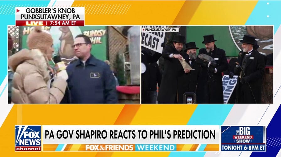 El gobernador Shapiro interactuando con la prensa en un evento p&uacute;blico en Punxsutawney