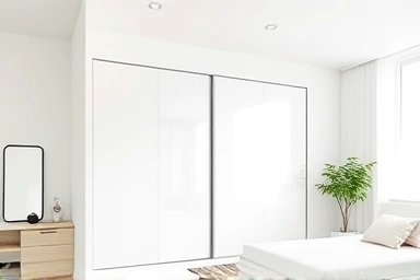 Spacious bedroom with integrated sliding wardrobe