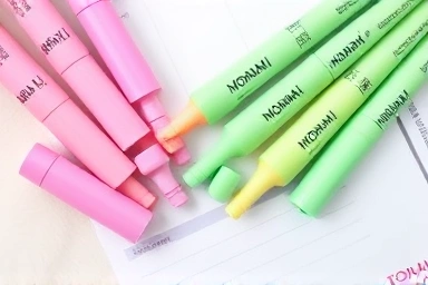 Vibrant pastel Monami highlighter colors fanned out.