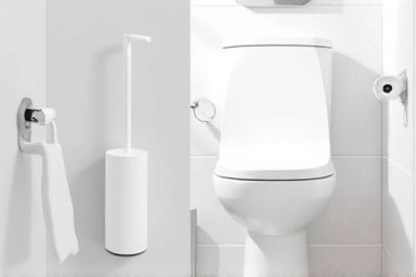 Modern bathroom with a clean silicone toilet brush.