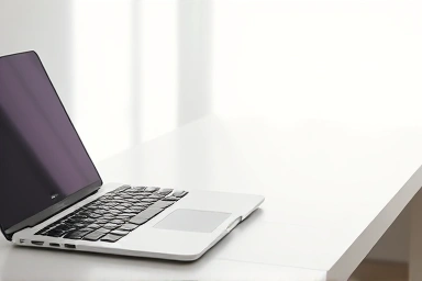 Modern laptop and mechanical keyboard connected wirelessly on a desk.