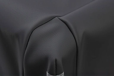 Close-up of durable, form-fitting stretch suitcase cover.