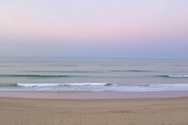 Serene Namhae beach at dawn, symbolizing peaceful solo travel.
