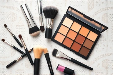 Professional makeup tools for contouring and sculpting the face.