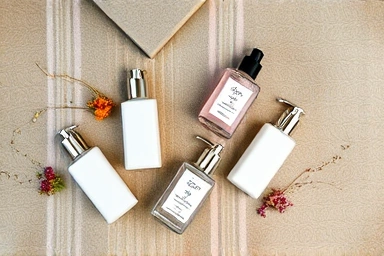 Elegant body lotion bottles, subtle fragrance, natural ingredients