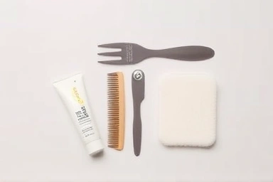 DIY hair down perm tools and products flat lay
