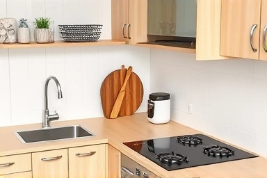 Optimized kitchen work triangle and smart storage solutions.
