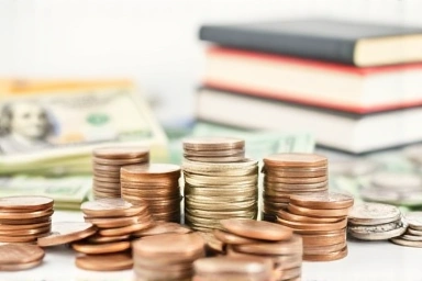 Symbolic image of smart budgeting and educational cost savings.