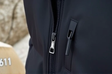 Close-up of Arcteryx Beta LT jacket Gore-Tex fabric and zipper.