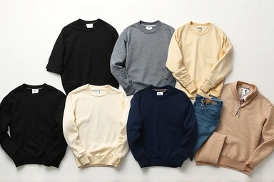 Flat lay of plain sweatshirts and casual bottoms, styled for effortless outfits.